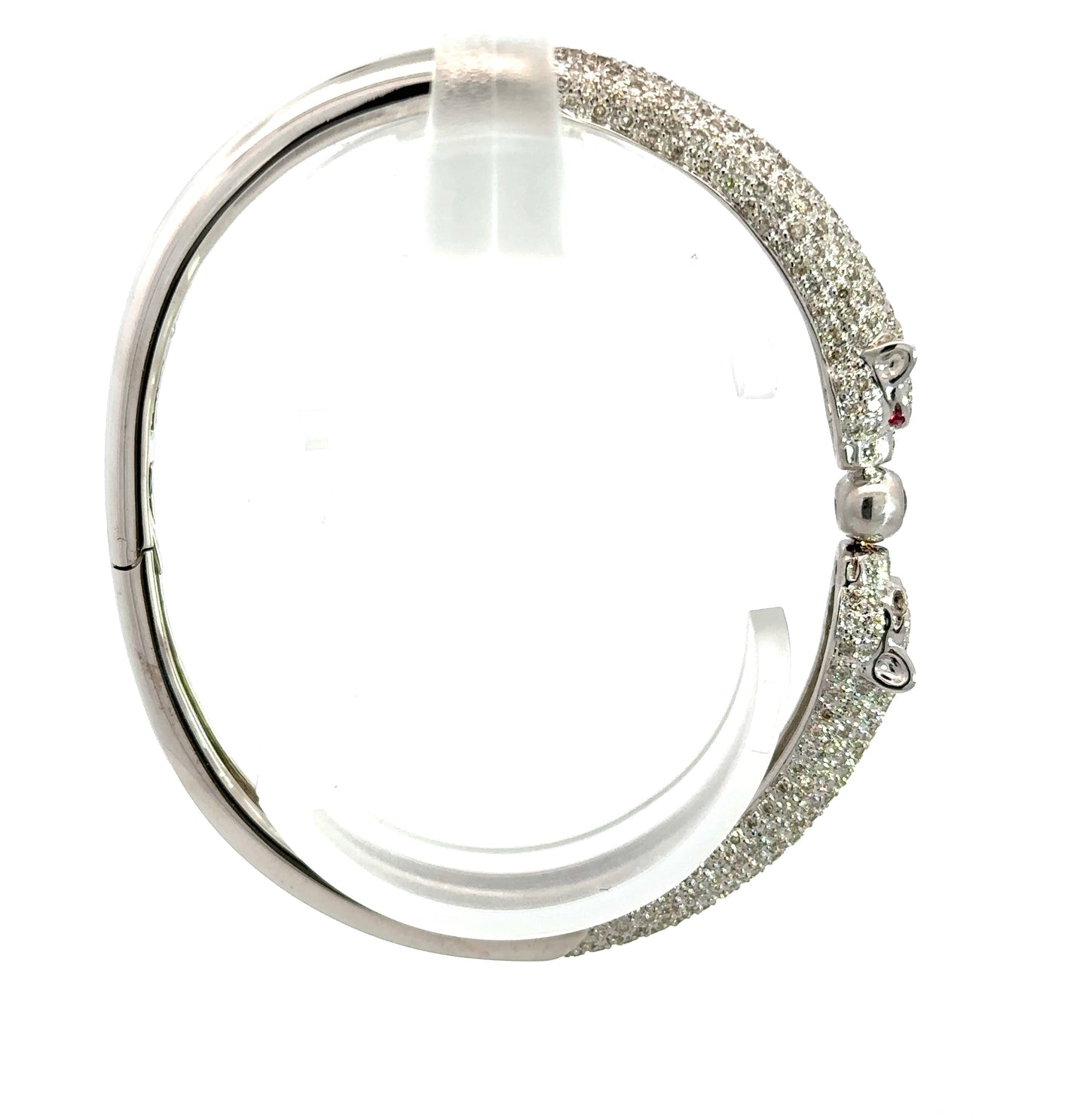 Side of white gold bangle bracelet with 2 panthers and diamonds on the panthers