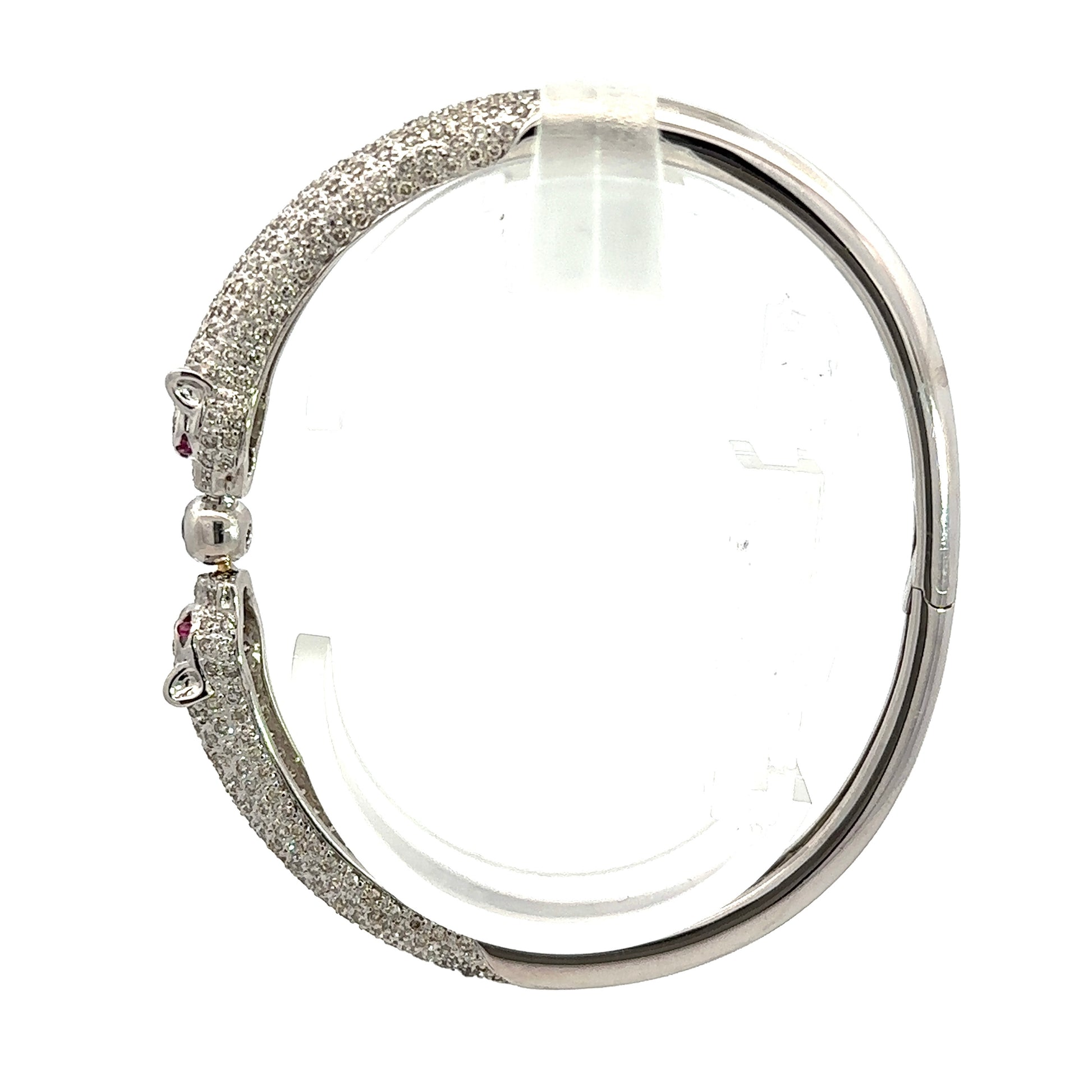 Side of white gold bangle with 2 diamond panthers