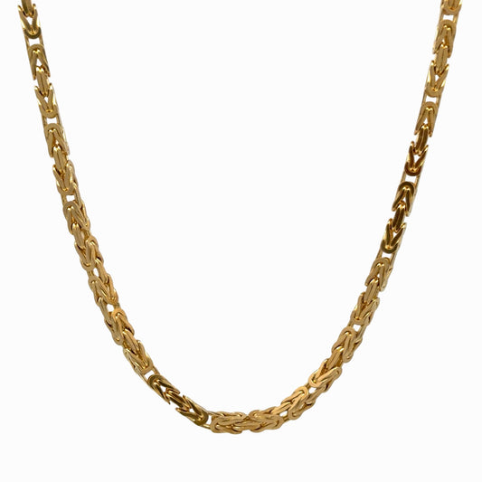 Close-up of the 14K yellow gold fancy link necklace showing the intricate chain pattern