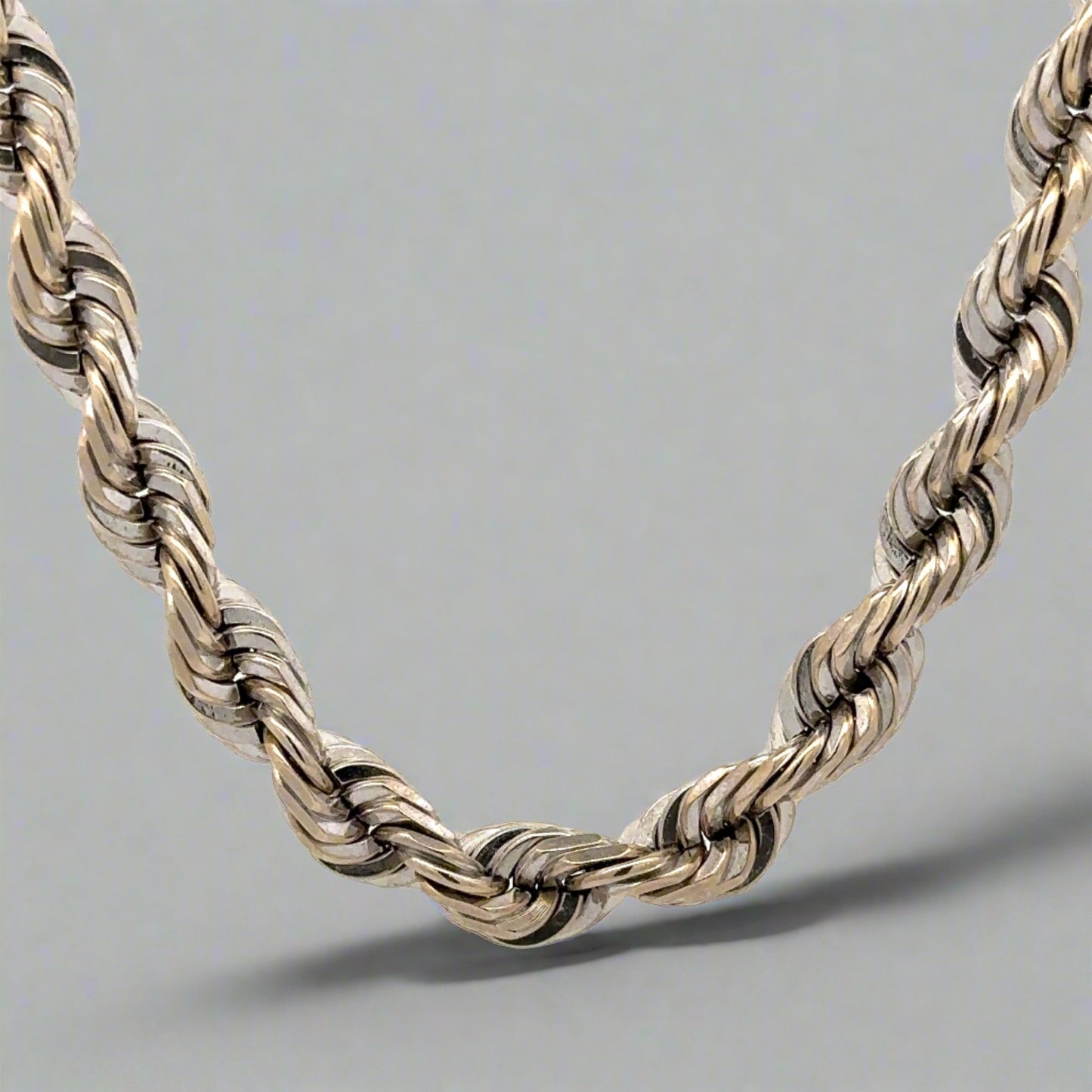 close up of white gold rope chain