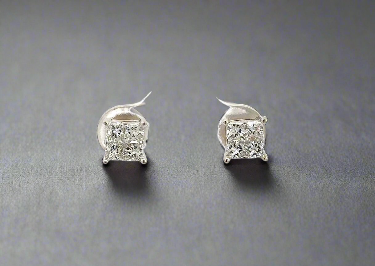 Front of diamond earrings with 4 princess-cut diamonds in each earring.