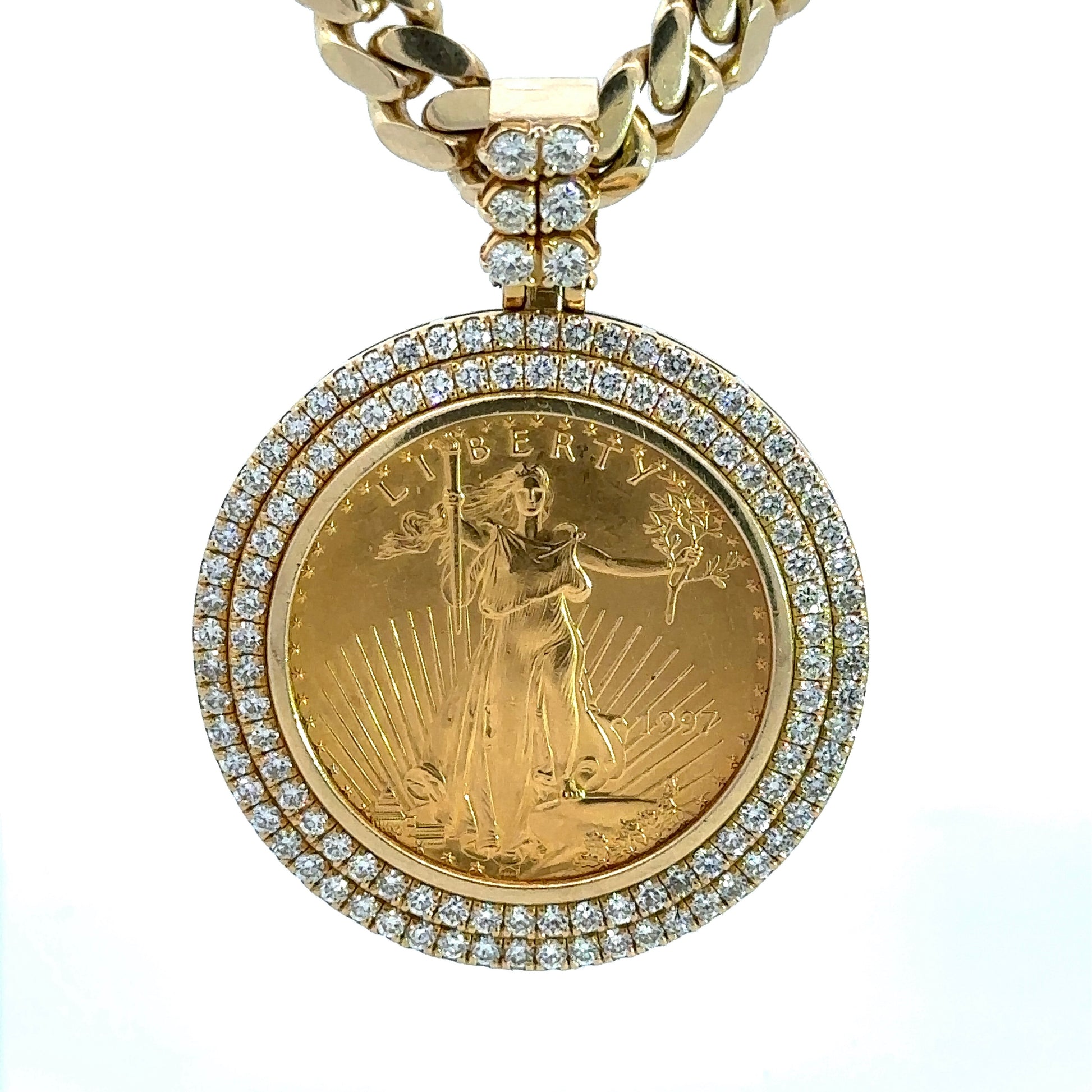 front of 1997 american eagle gold coin with 2 rows of diamonds on the bezel and 6 diamonds on the bail.