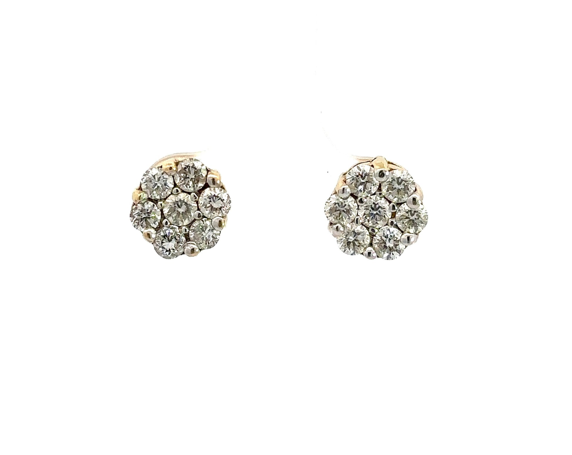 Diamond flower shaped earrings with 7 round diamonds in each ear.