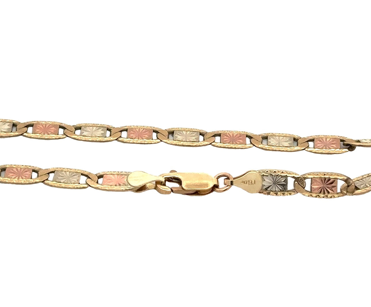 close up of mariner chain in tri color gold with 417 stamp on lobster clasp