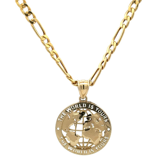 Yellow gold link chain with a round world pendant that says "the world is yours" on top and bottom