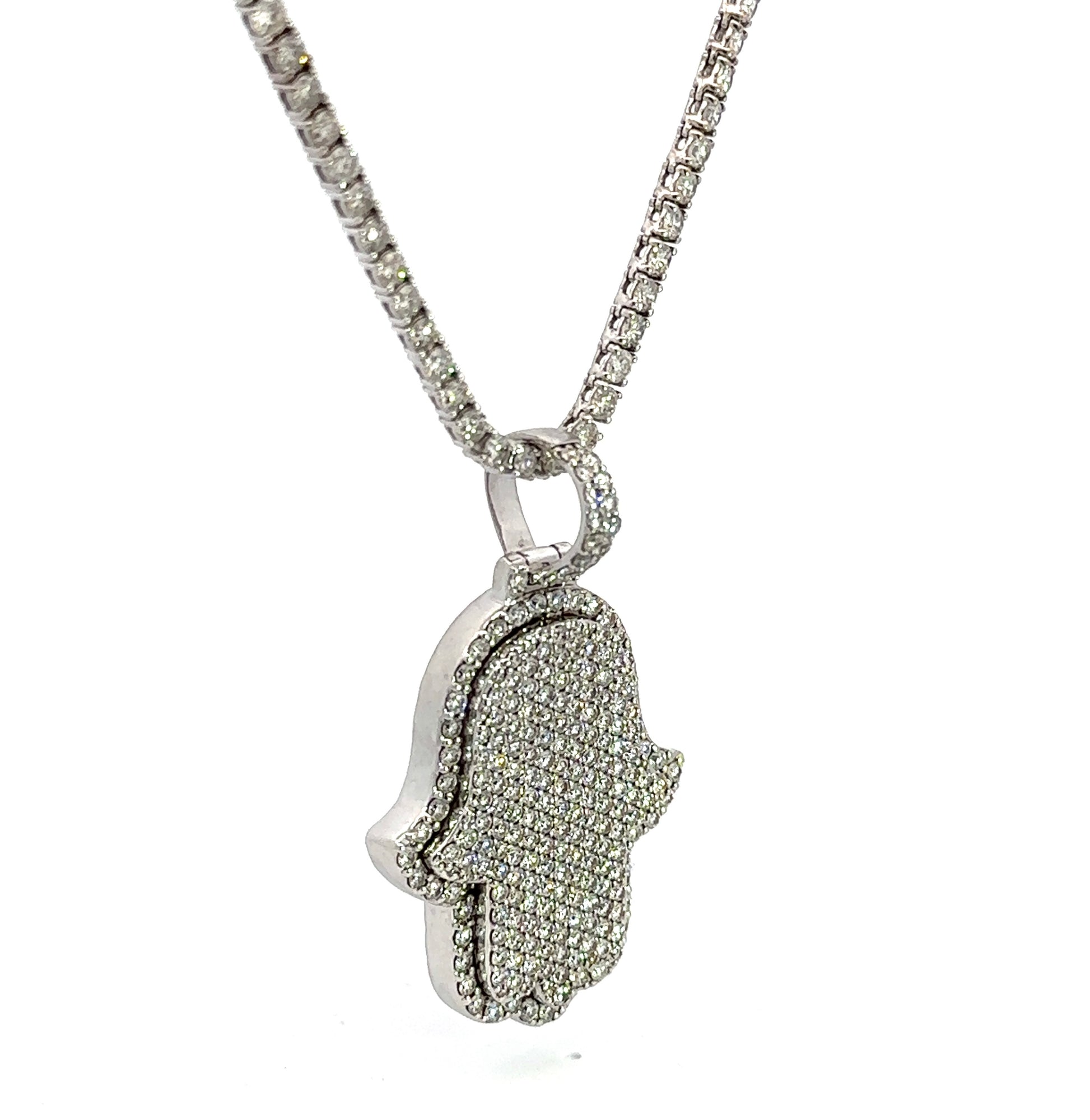 diagonal view of diamond chain and hamsa pendant