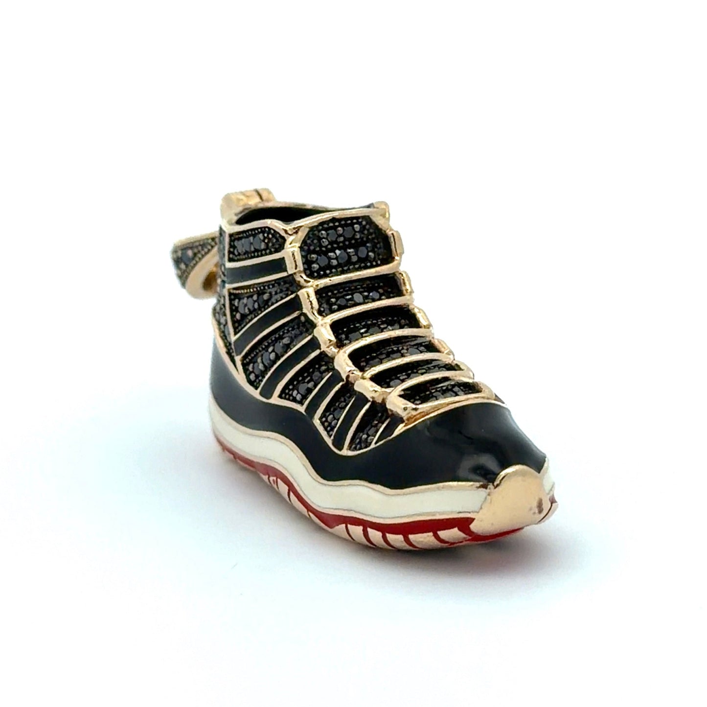 Diagonal view of black diamond shoe on a white background