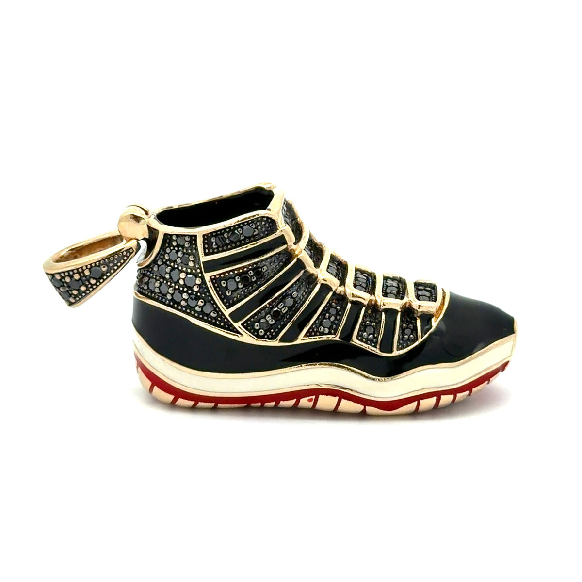Black and gold shoe charm on a white background