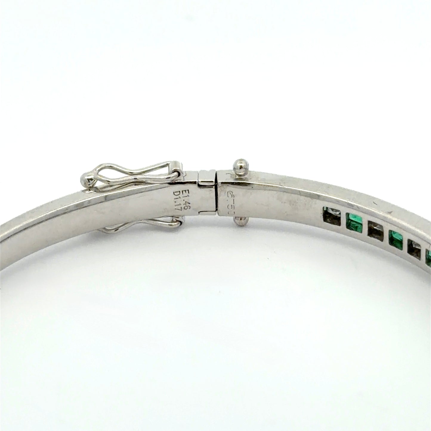 E1.46 D1.17 750 engraved on white gold bracelet