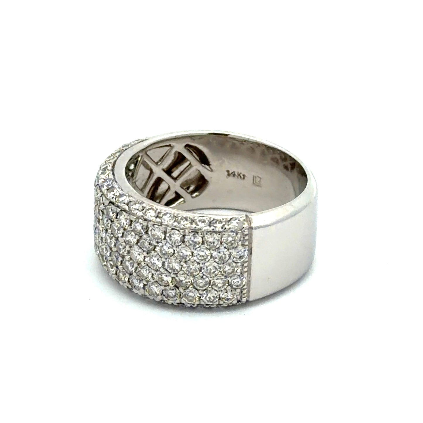 White gold ring with round diamonds on half the band and 14K stamp