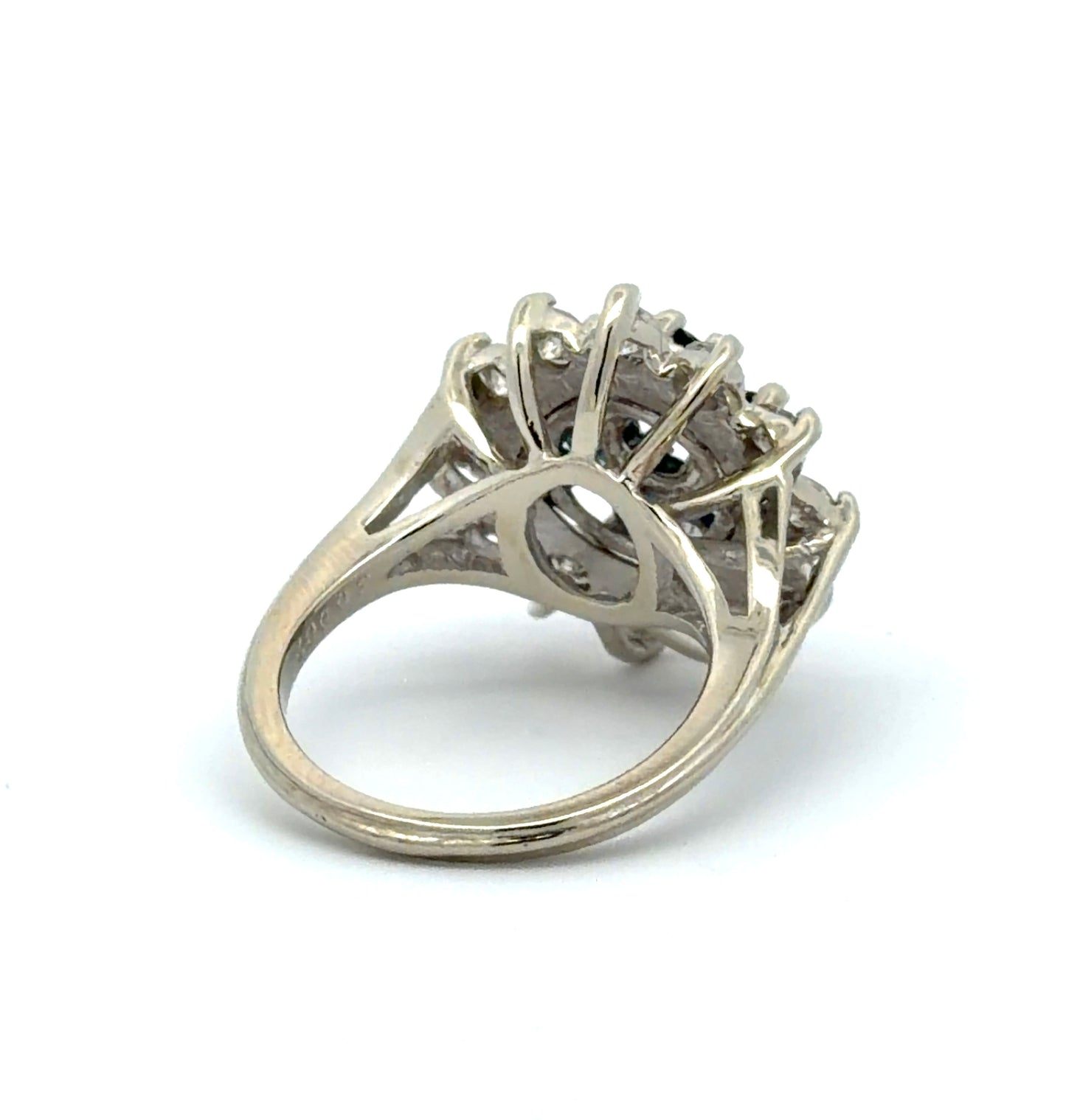 Back of white gold ring on a white background
