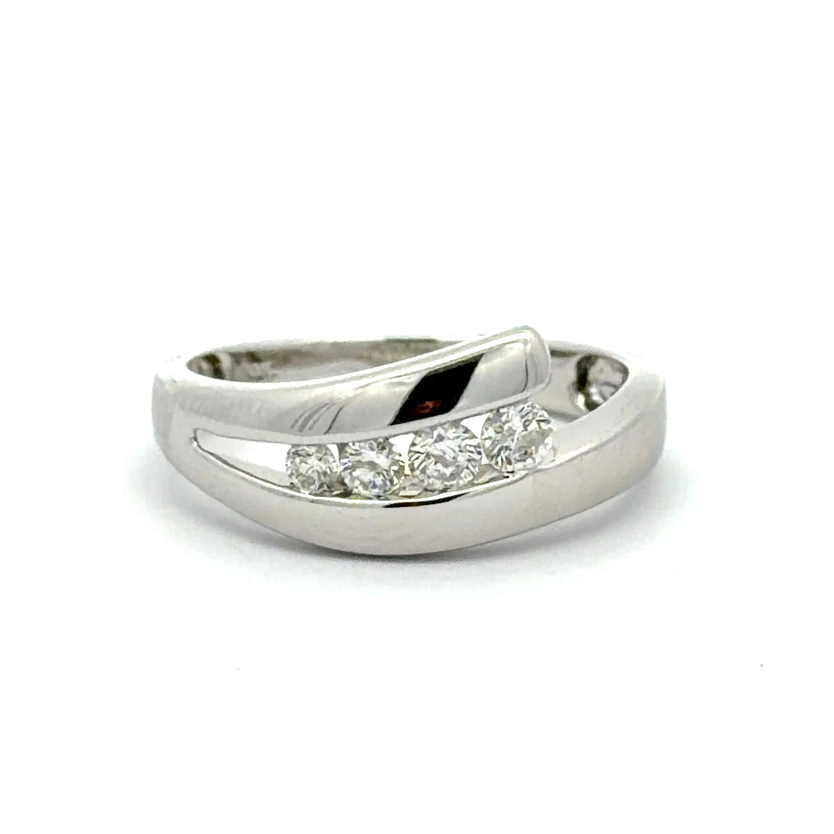 White gold ring with 4 round diamonds on a white background