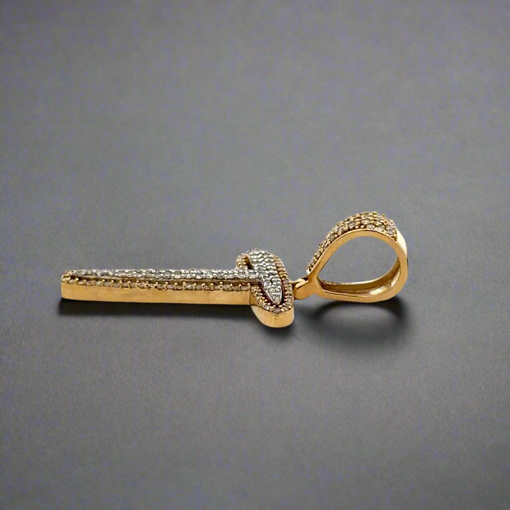 Side of diamond T pendant