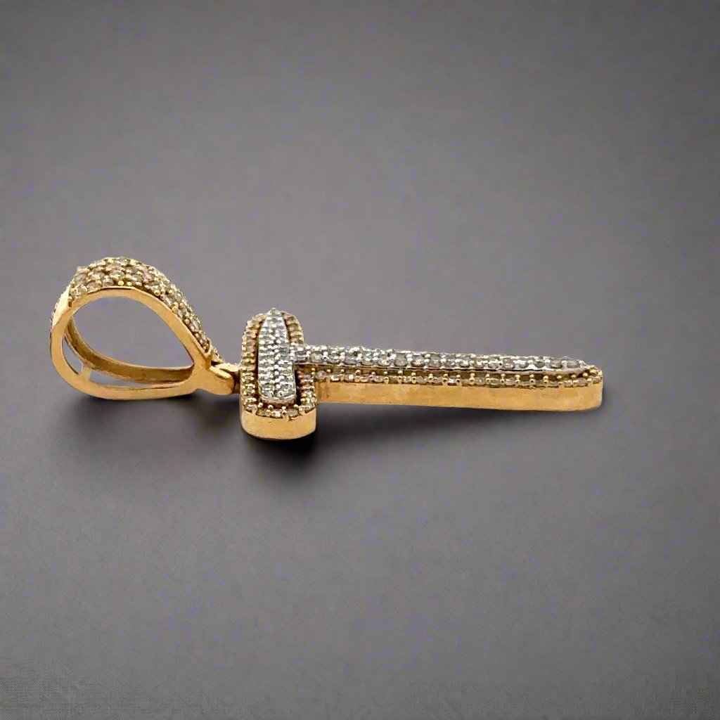 Side of diamond T pendant