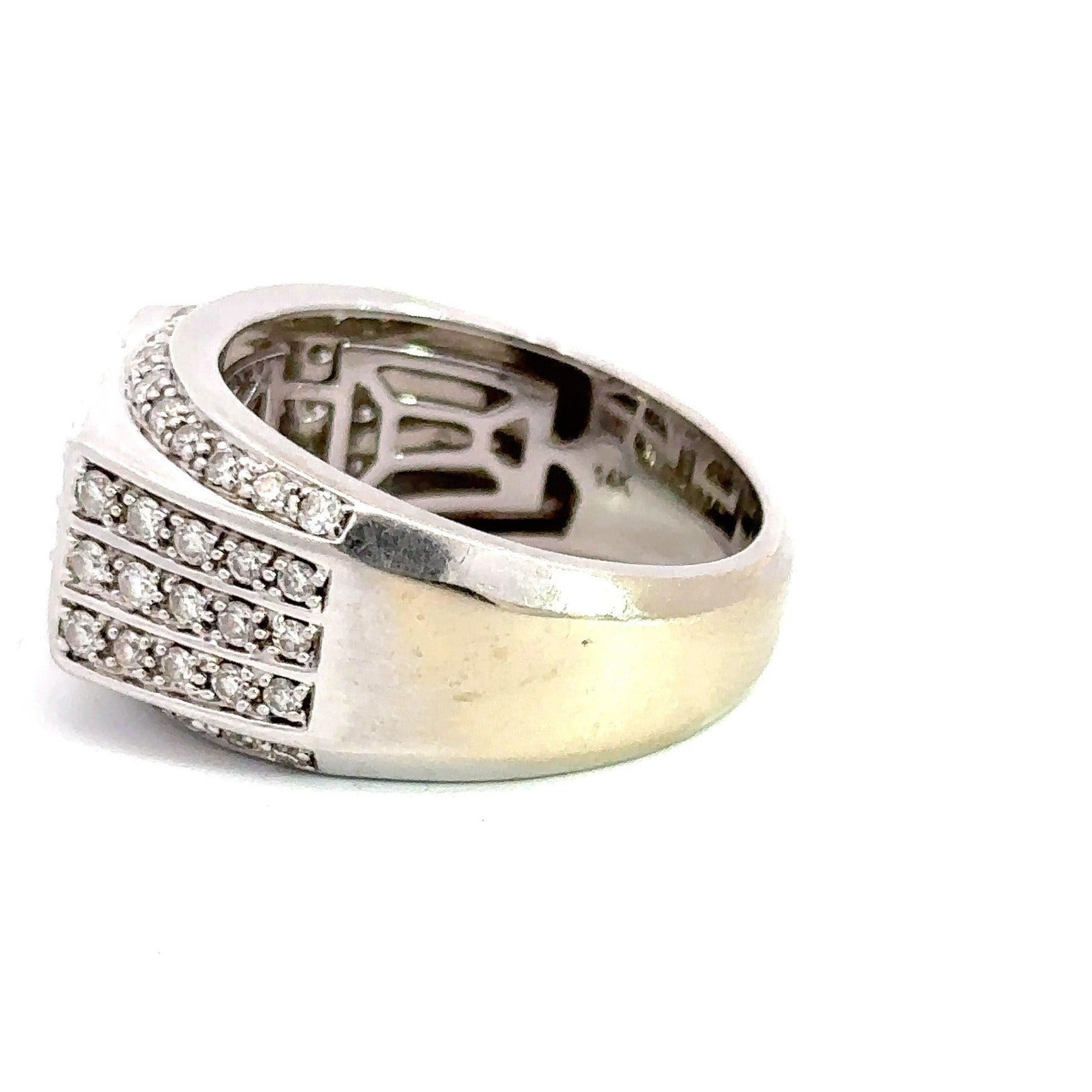 Side of white gold ring with tool marks