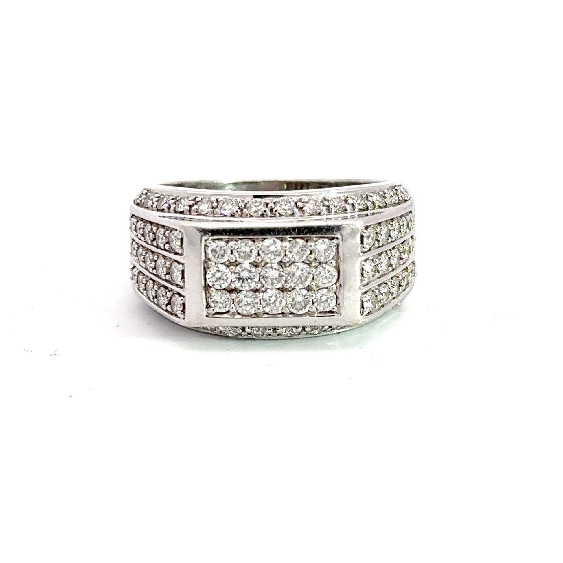 Front of diamond ring with 15 round diamonds in center, diamonds on top and bottom of band, and 3 rows of diamonds on each side