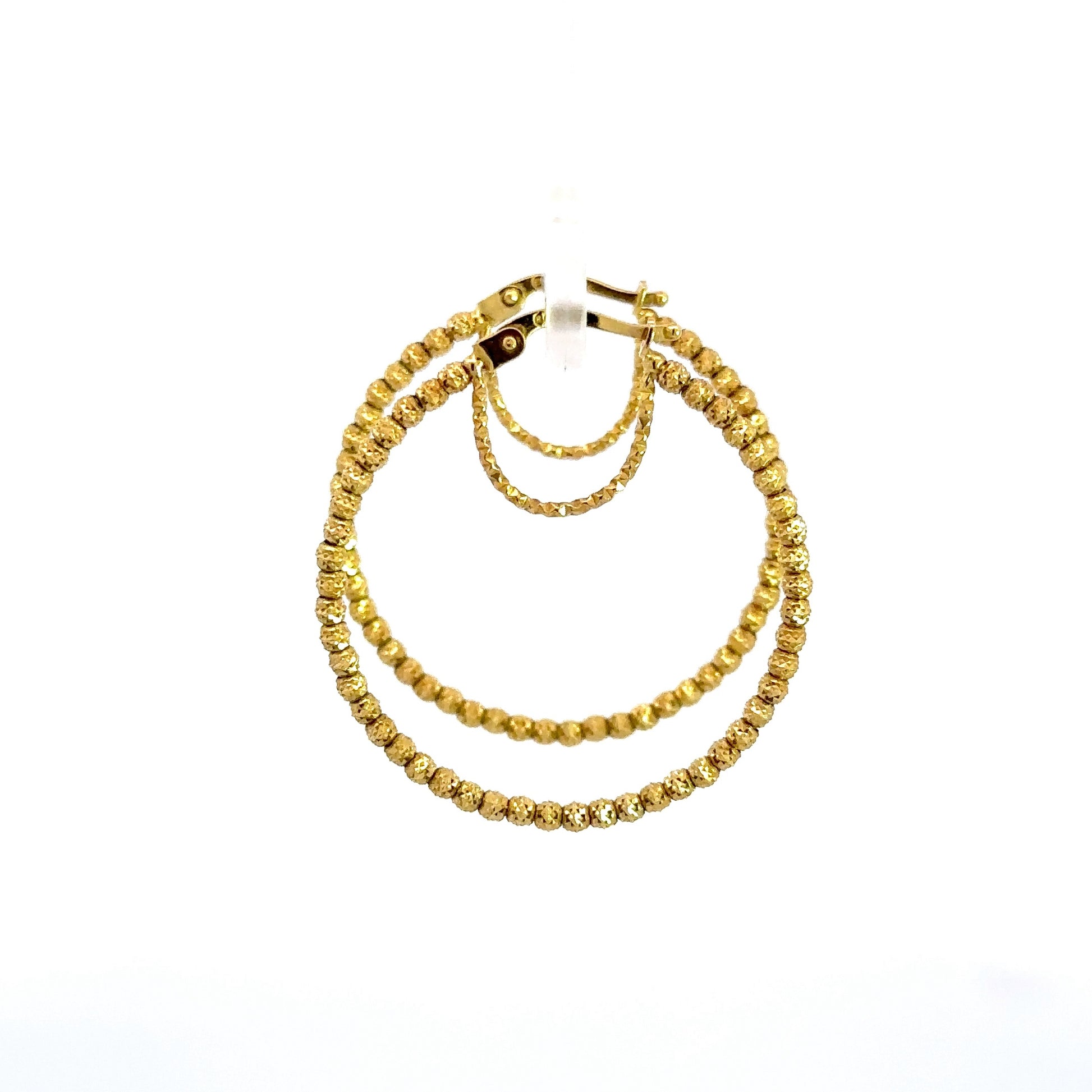 side of beaded yellow gold hoops