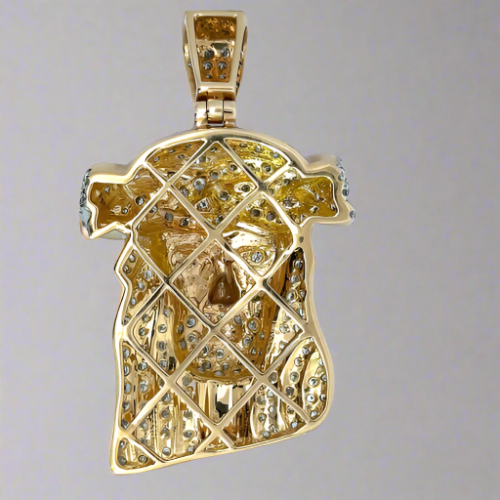 Back of the diamond Jesus pendant. It is open, hollow gold.