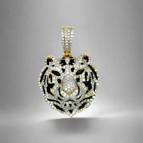 Front of diamond tiger pendant. Diamonds throughout tiger face with black enamel. Diamonds on barrel.