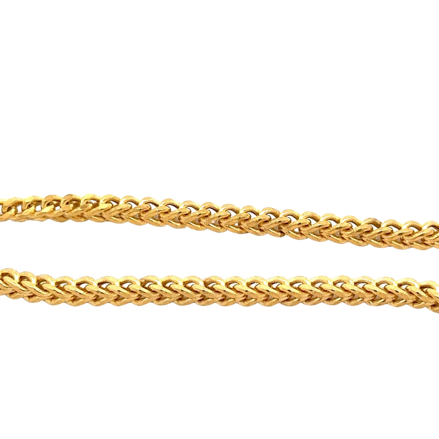 Close up of square yellow gold Franco chain