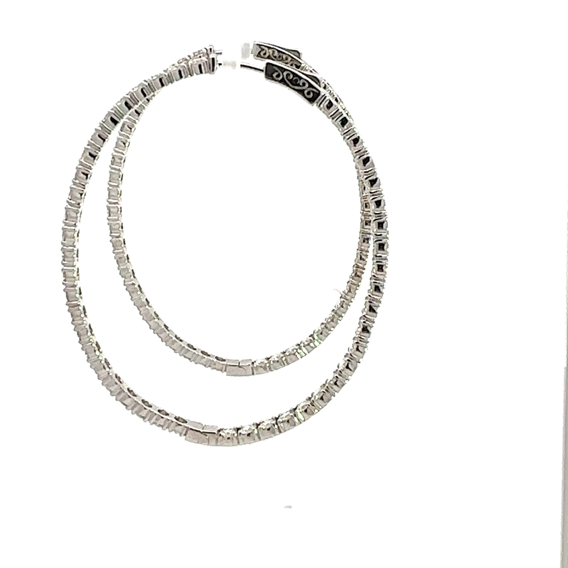 Side of white gold hoops with lock