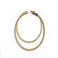 Side of yellow gold hoops with lock