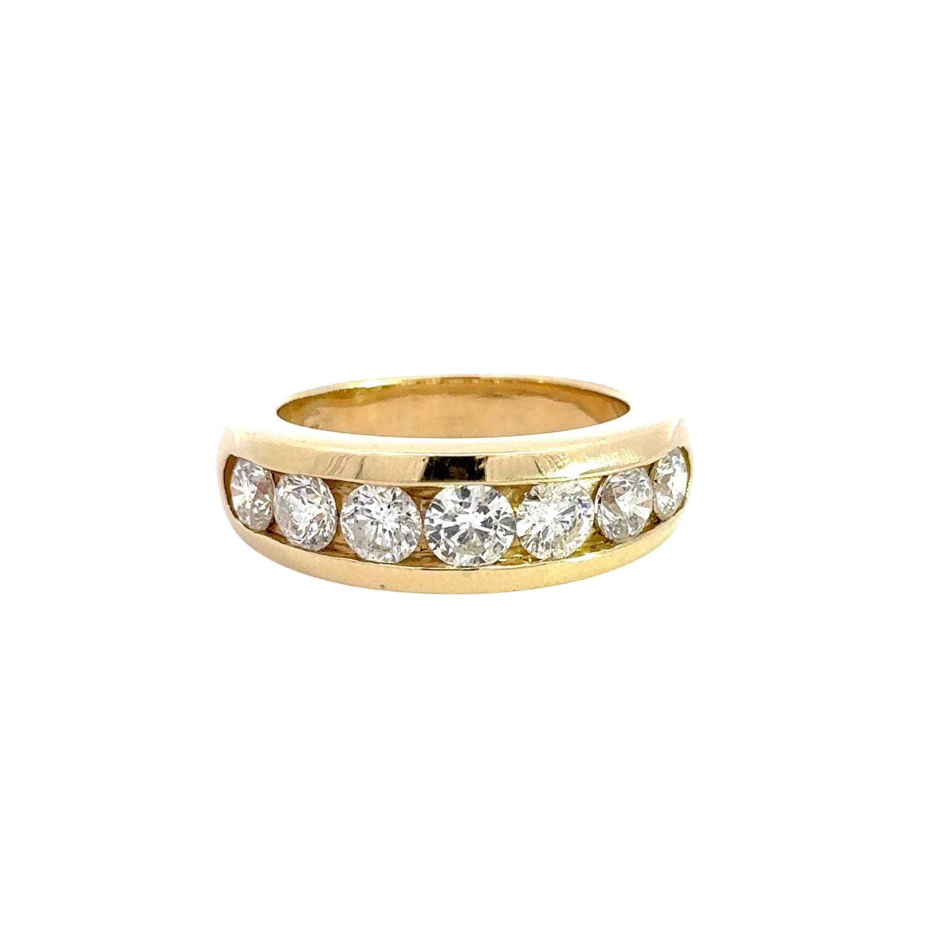 Front of man’s diamond band ring with 7 diamonds ranging from .25-.33 carats in 14k yellow gold 
