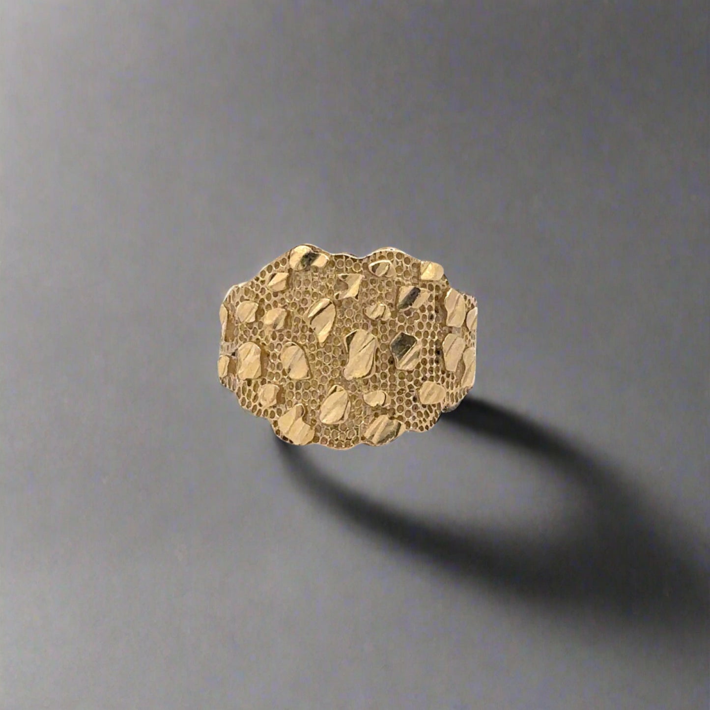 Front of yellow gold nugget ring