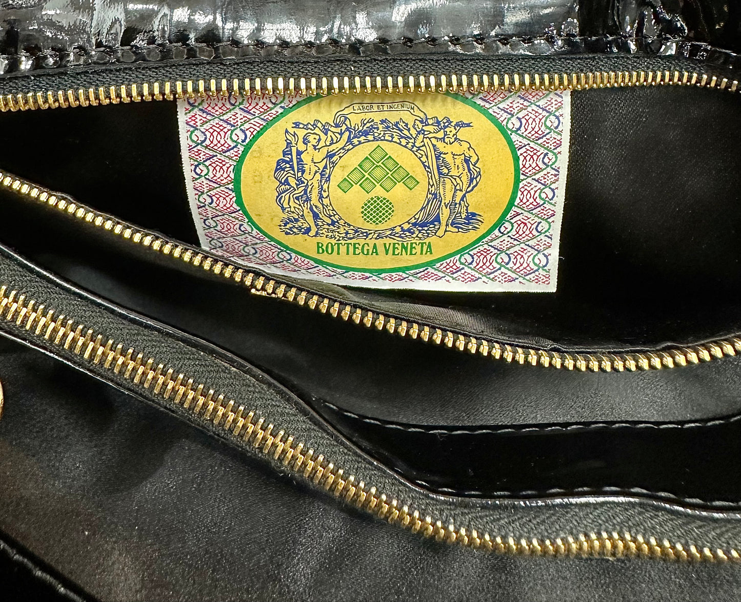 Close up of Bottega Veneta tag