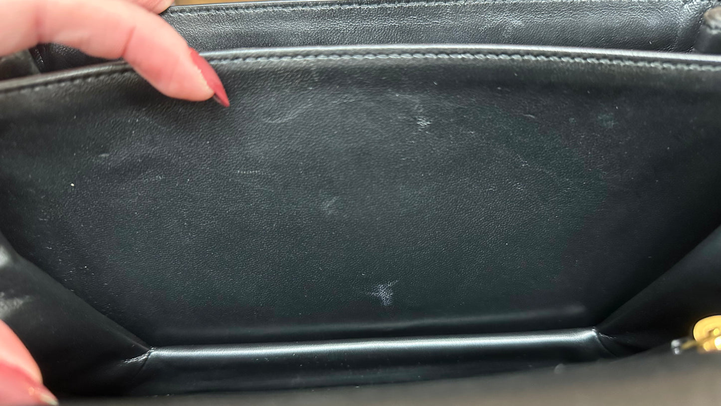 Close up of white scuff marks in black interior