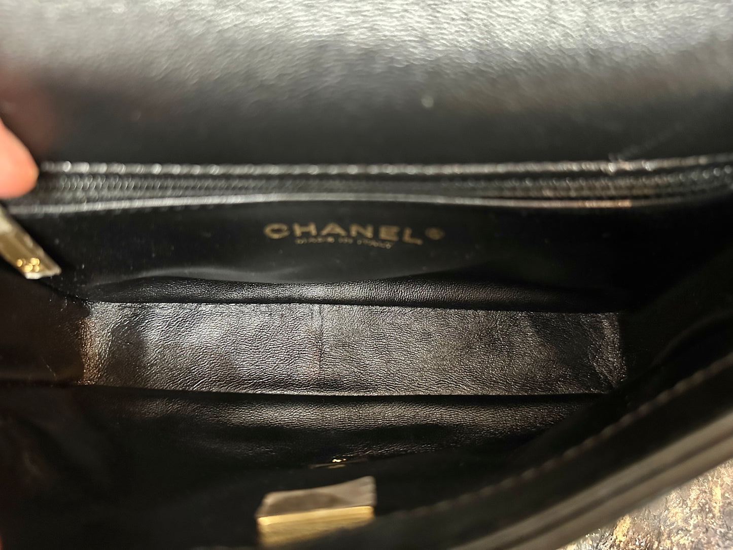 Top view of inside of bag with black leather