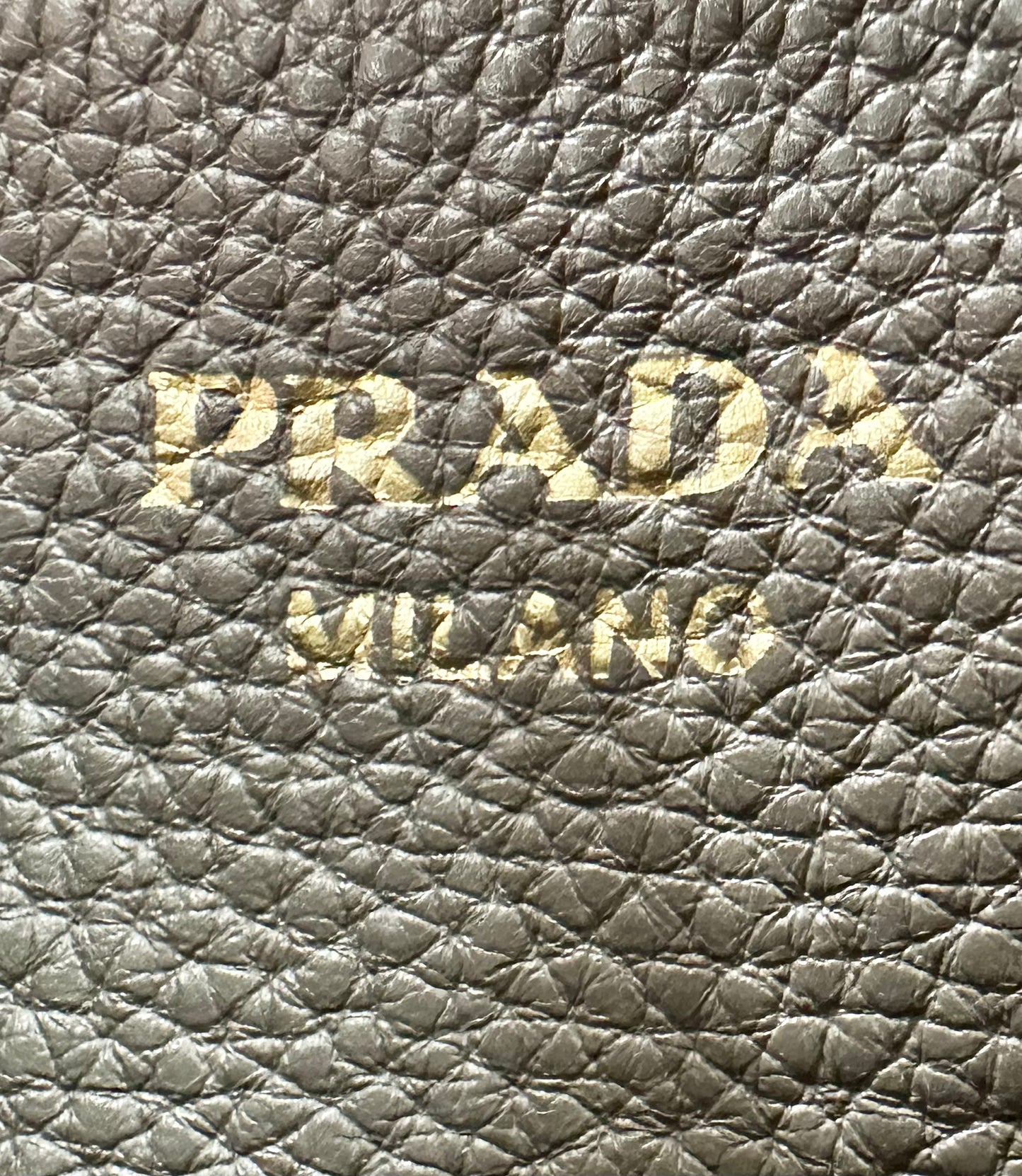 Close up of Prada logo in interior