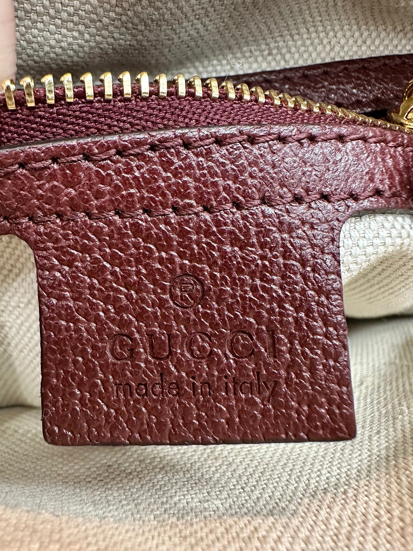 Burgundy Gucci logo leather tag inside
