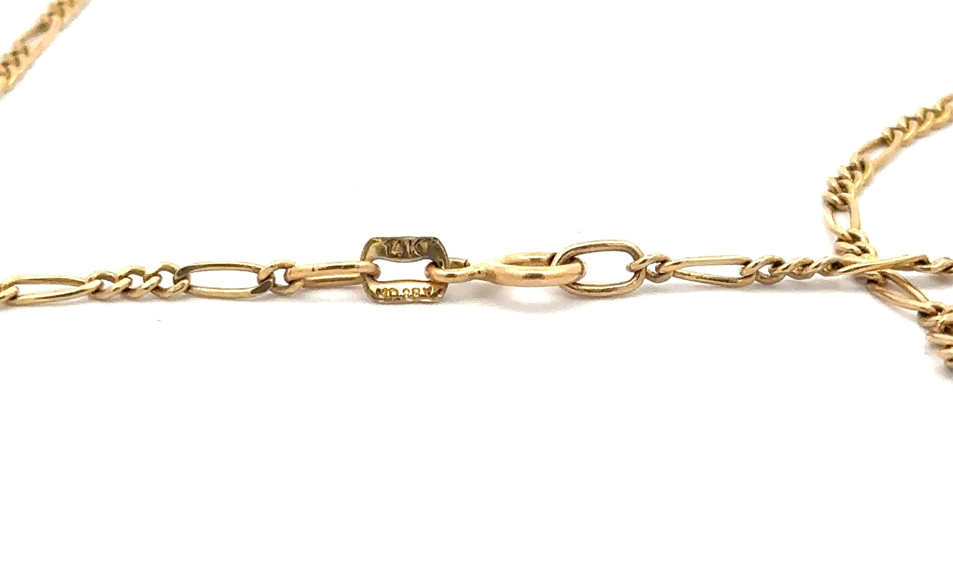 14K stamp on yellow gold spring ring clasp
