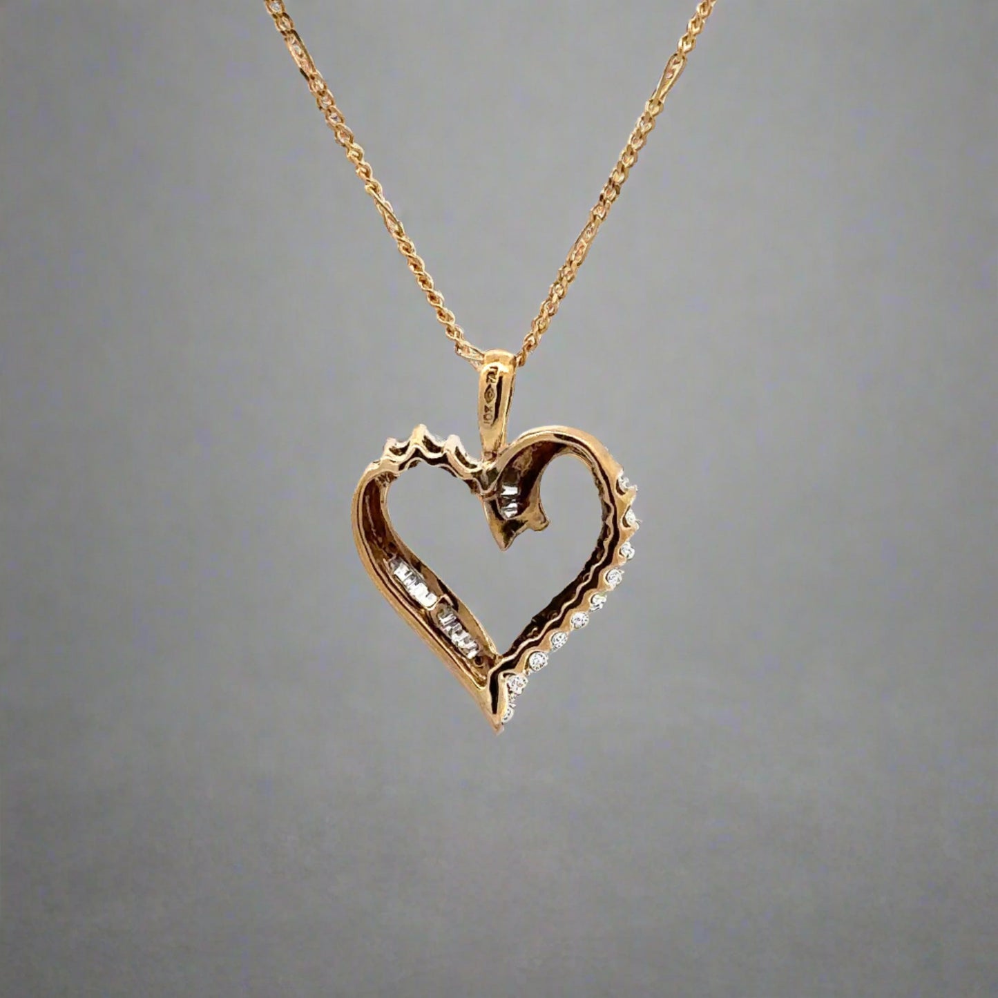 back of yellow gold heart with 10K stamp