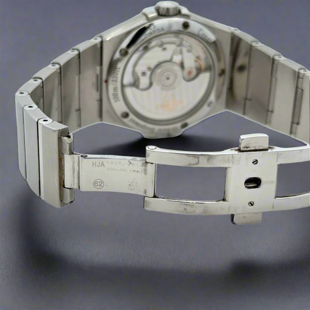Back of watch with open clasp.