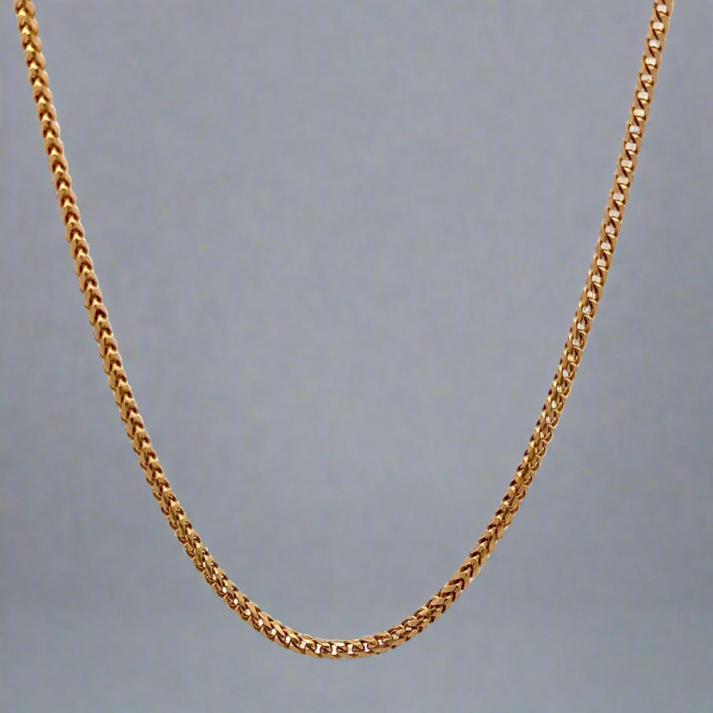Round style yellow gold franco chain