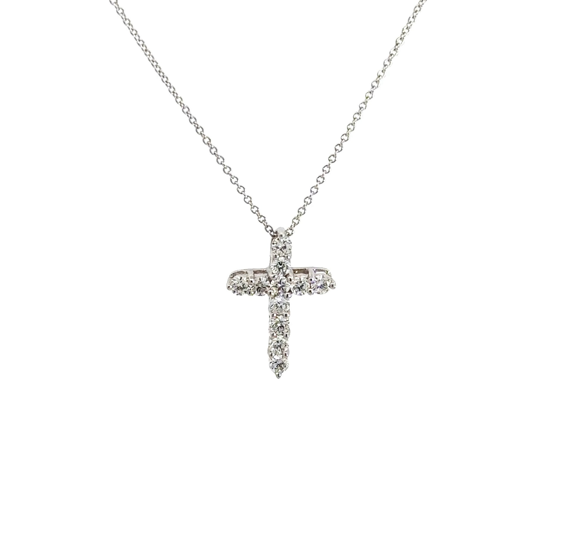 front of white gold diamond cross necklace