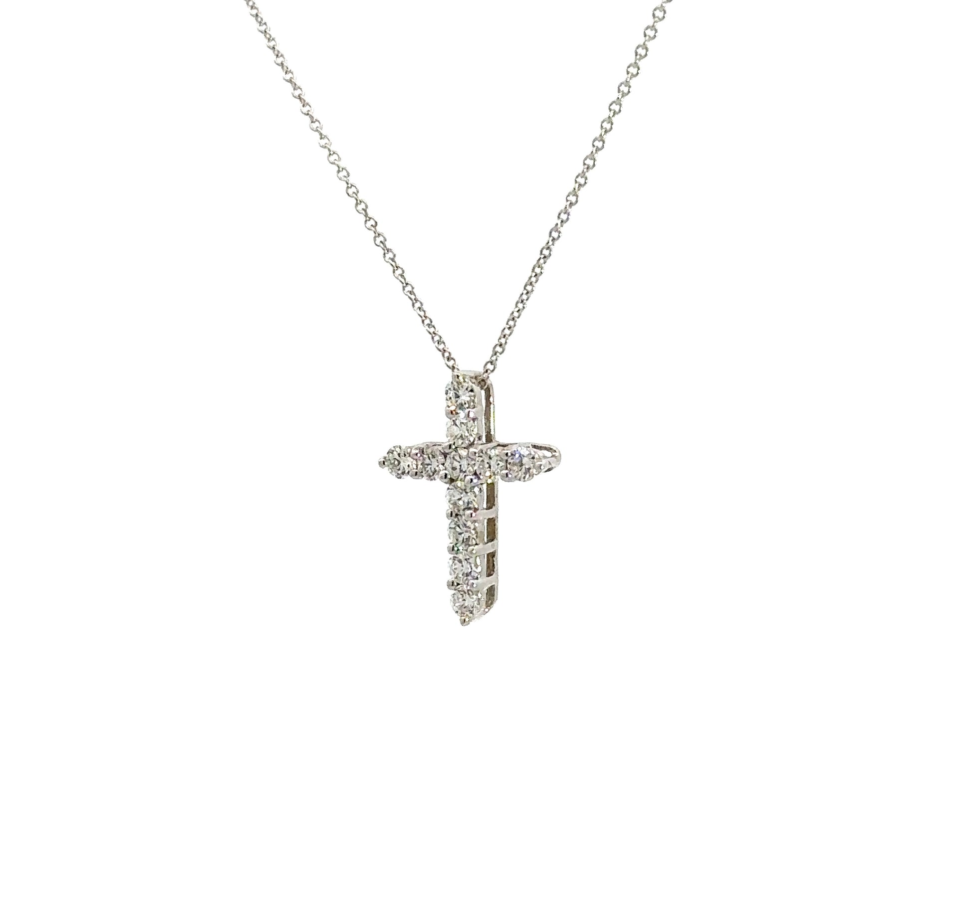 diagonal view of white gold diamond cross necklace