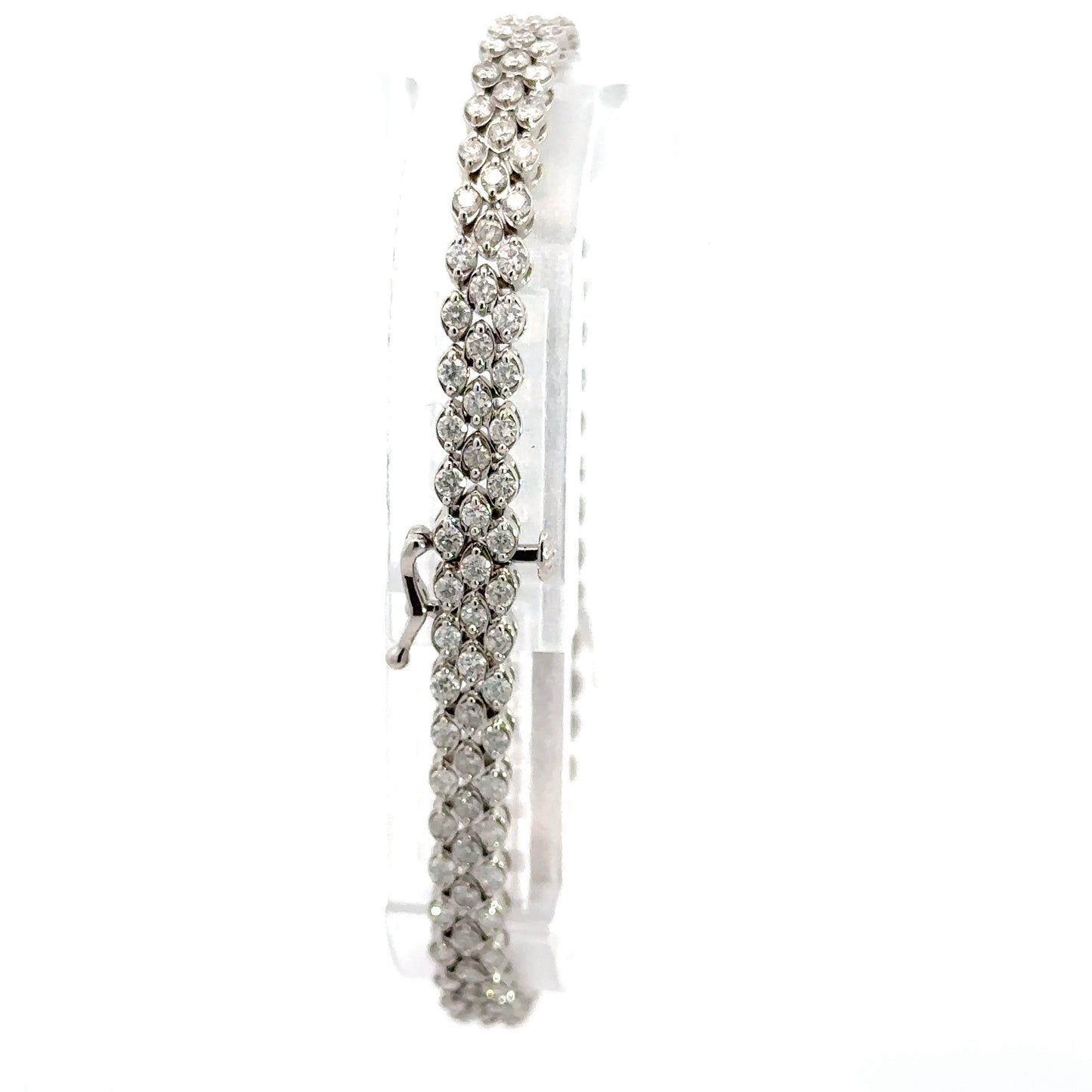 Back of diamond bracelet showing clasp and safety lock with diamonds throughout bracelet