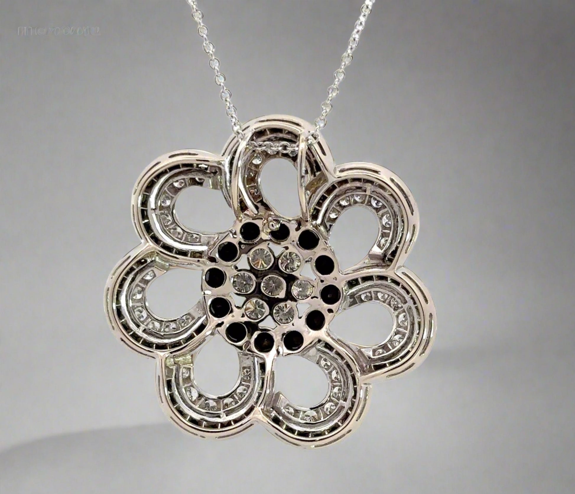 back of flower necklace in white gold