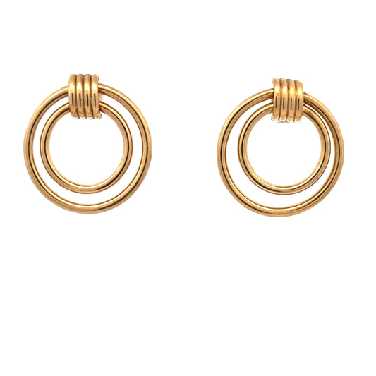 Front of yellow gold stud earrings with 2 circles, 1 smaller, 1 bigger.