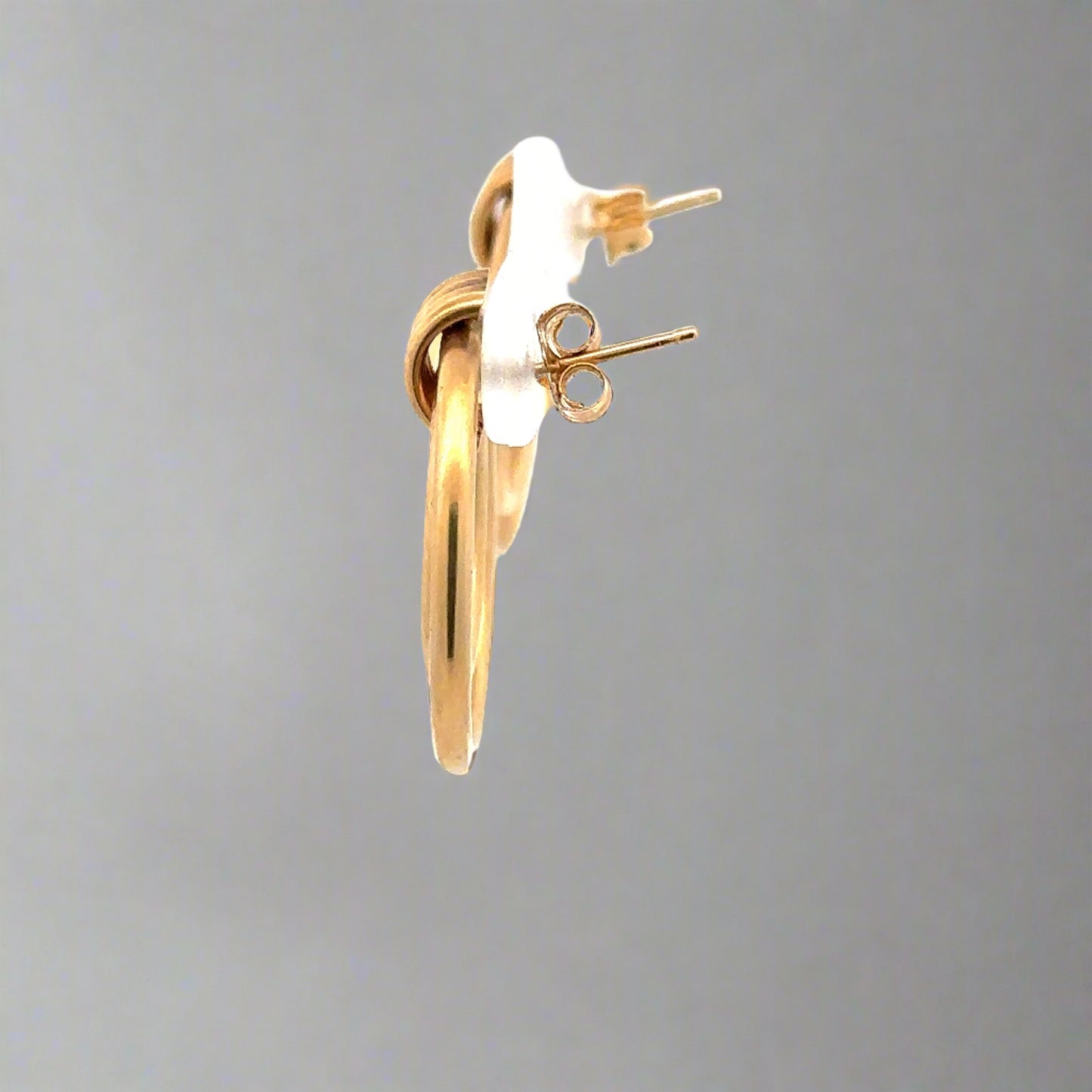Side of earrings with pushbacks