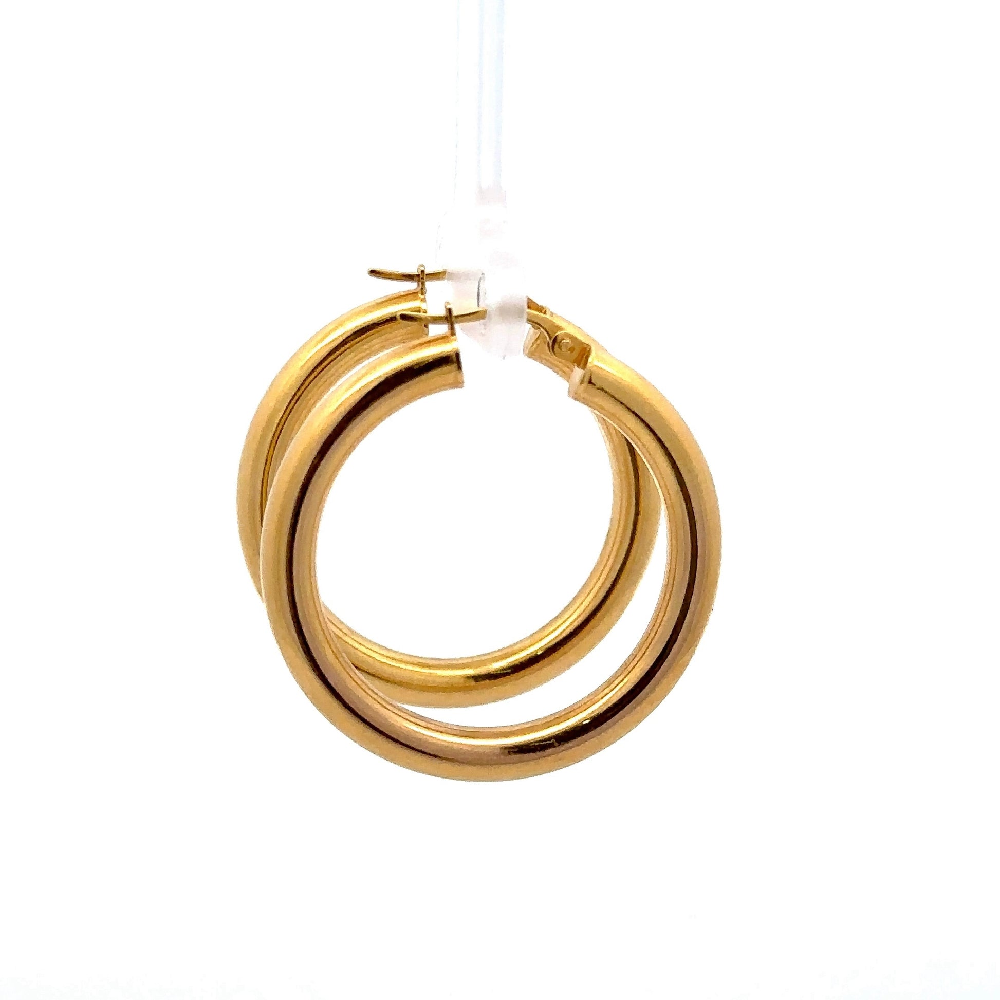 side of polished yellow gold hoops