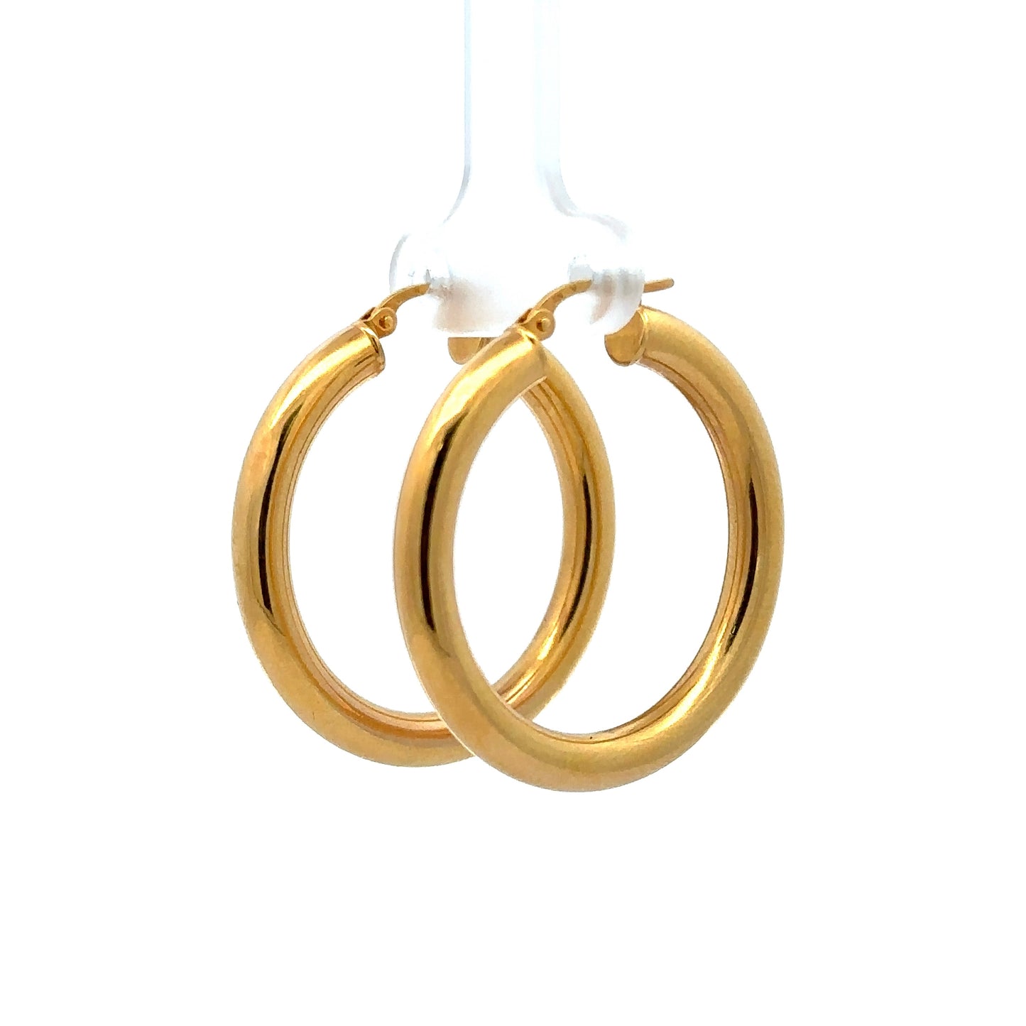 diagonal view of polished yellow gold hoops