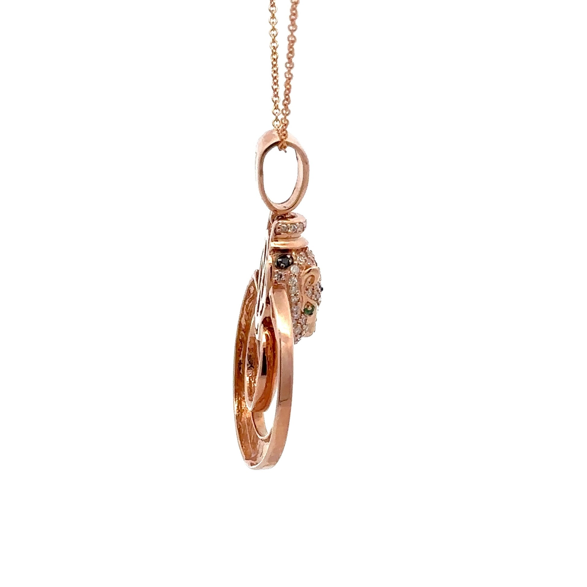 Side of rose gold pendant with round bail