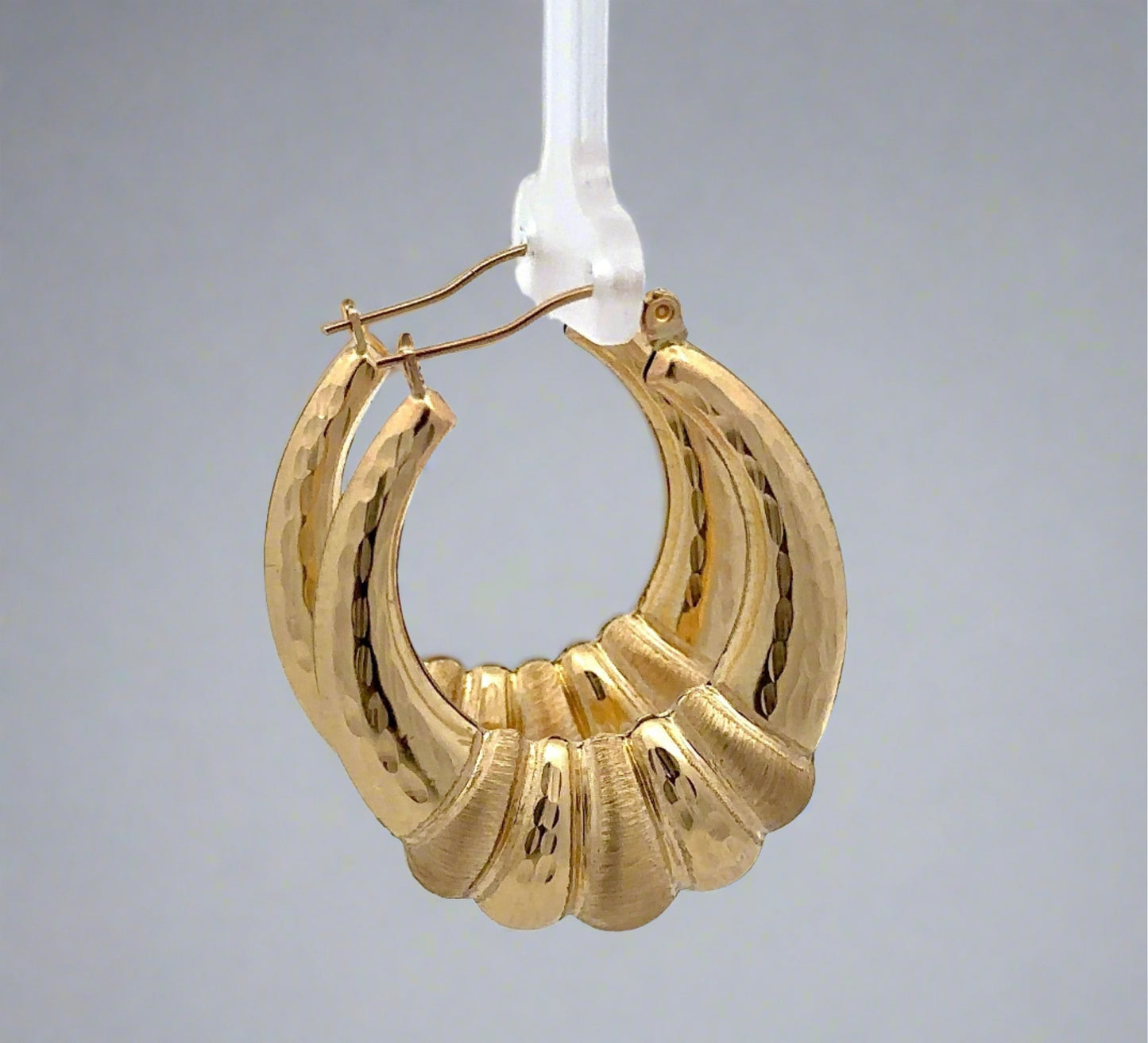 side of yellow gold hooops