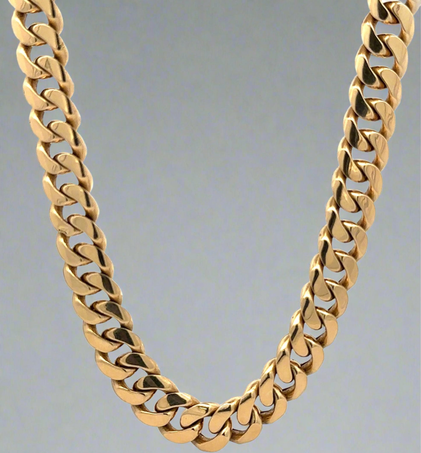 hanging yellow gold cuban link chain