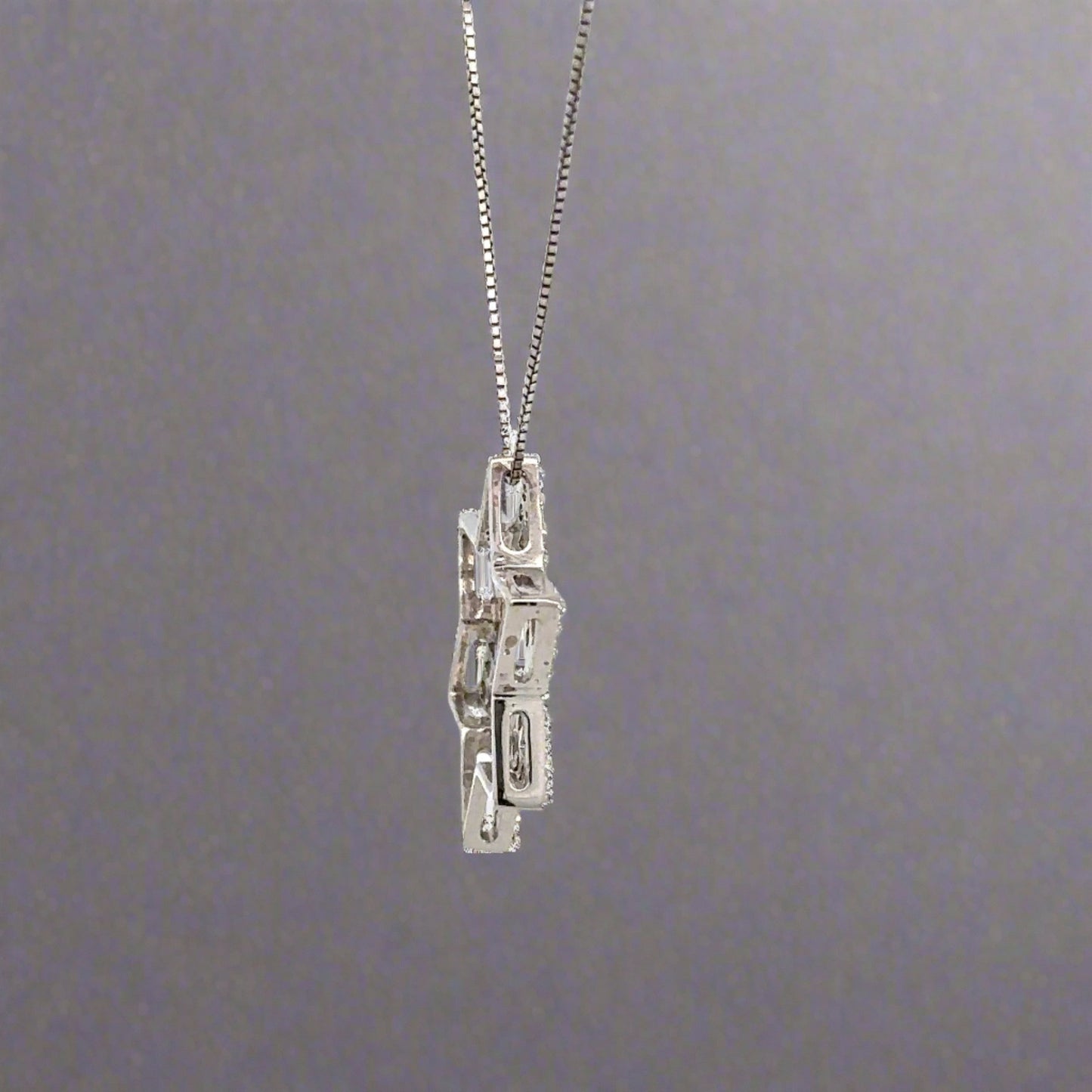 side of white gold star necklace
