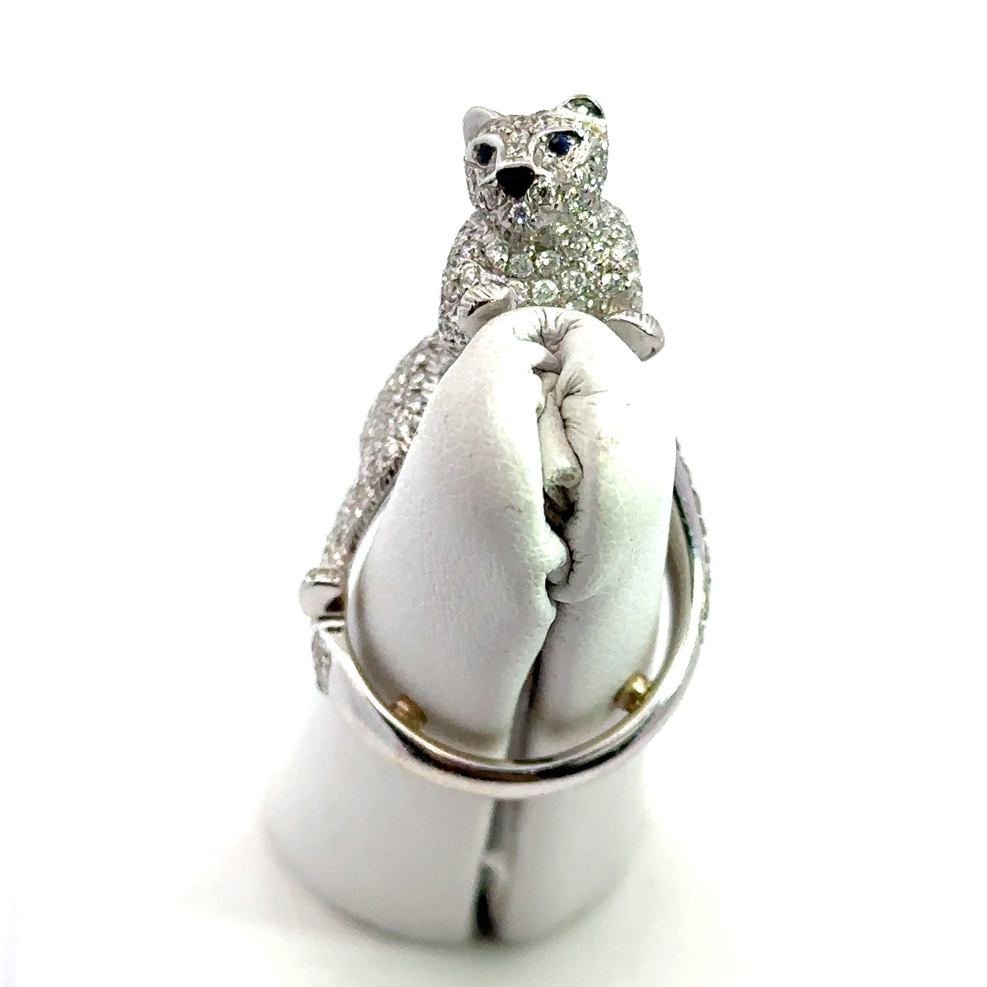 Front of diamond panther ring. There are 2 sizing beads in th ering.